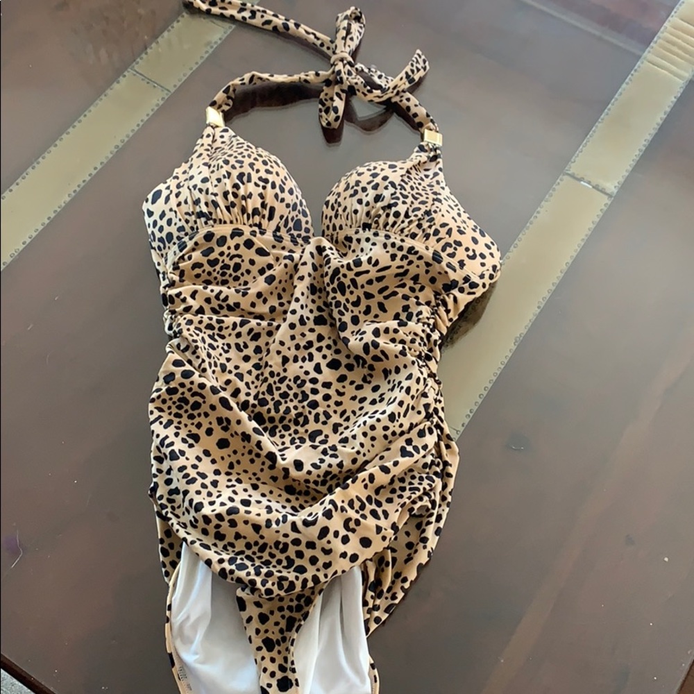 Victoria secret one pice swim suit.